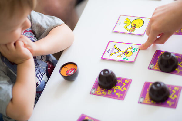 child learning with cards